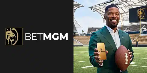 BetMGM Sportsbook mobile banner showing an elegant man holding an American football ball presenting a smartphone displaying current betting promotions